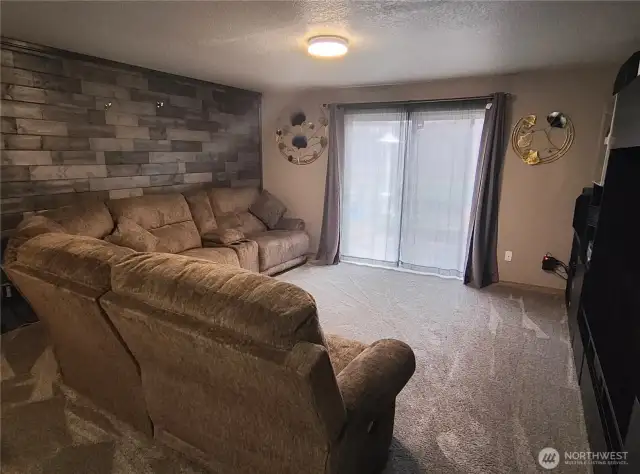living room with wood wall