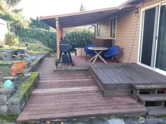 back porch with awning and decks