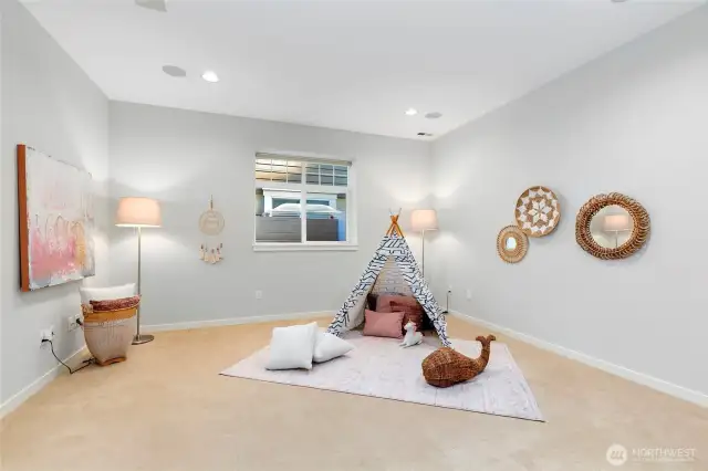 Lower level offers lots of flexibility.  This space is a perfect media/playroom or gym!
