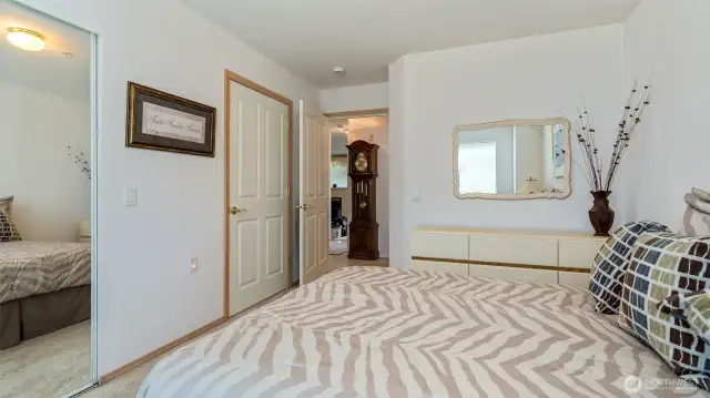 This door leads to an ensuite bath
