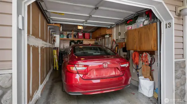 Lots of cabinets and shelving for additional storage inside the garage.