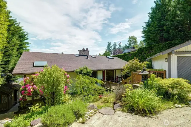 Lush landscaping surround the home.