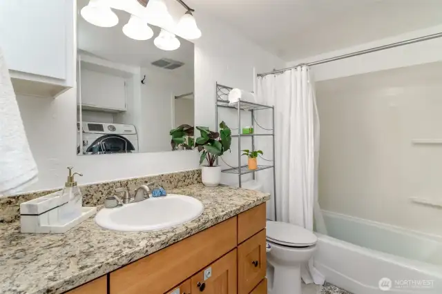 Downstairs Bathroom with Laundry Area