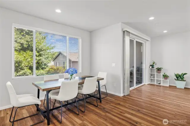 Dining room and slider to the balcony.