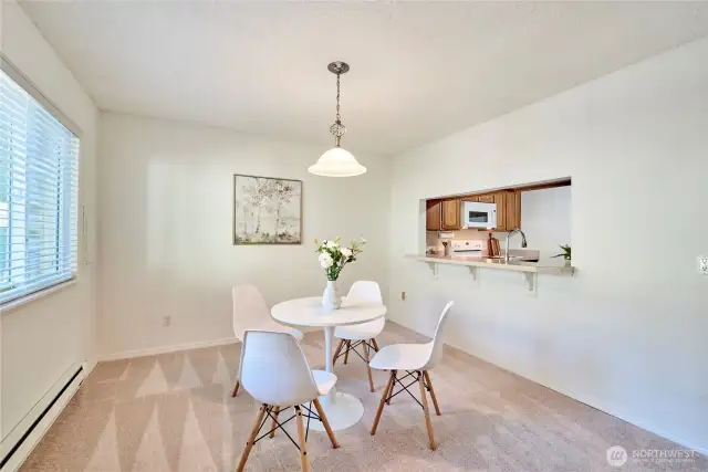 A look at the dining room and the large "pass through window" to the kitchen.