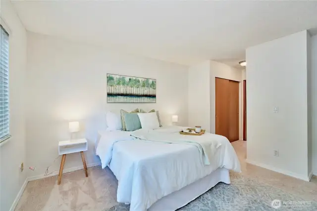 Another look at the primary bedroom. There are closets on either side of the short walk to the en-suite primary bathroom.