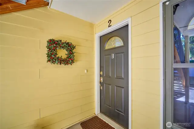 Here's the font door of the unit. The entry is covered so you wont get wet when finding your house key! It's also a very short walk from the car to the front door.