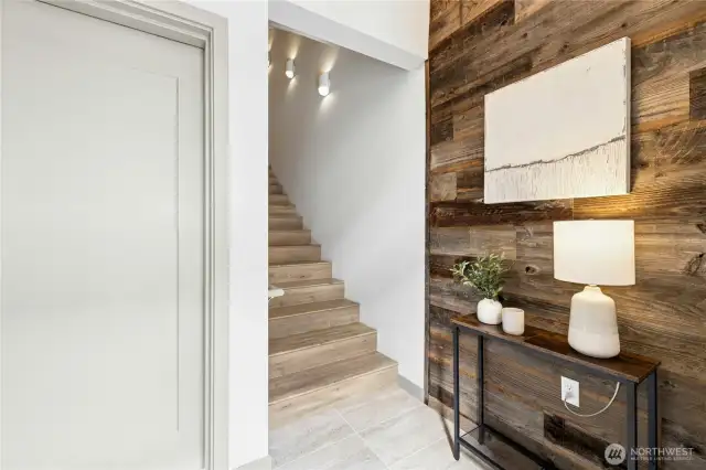 A roomy entryway greets your guests and welcomes you home. The door to the left goes to your attached two-car garage.