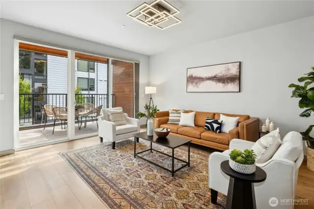 The main living level is light and bright with an open-concept living area and a roomy front deck.