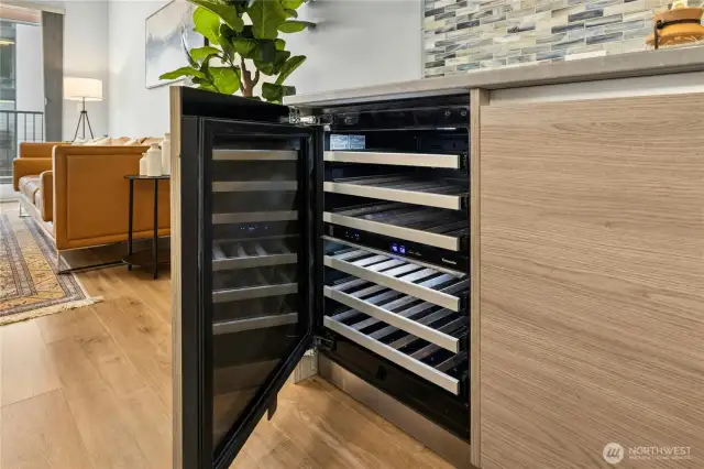 The Thermador beverage fridge on the buffet/bar.
