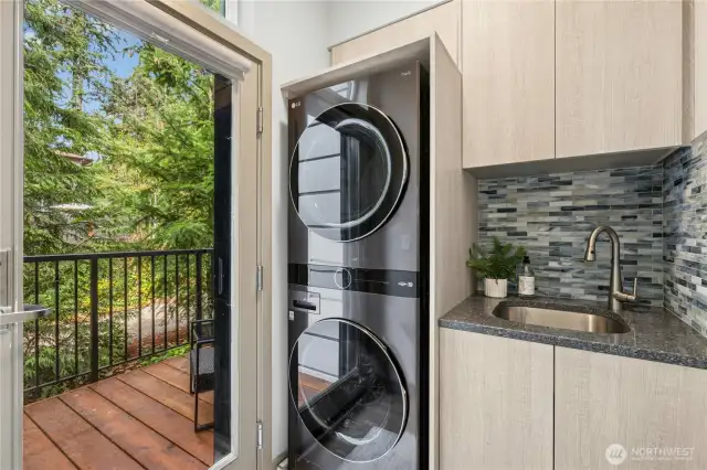 The laundry area was also re-designed adding a one-piece LG Smart Tower stacking W/D and incorporating a new handy sink too.