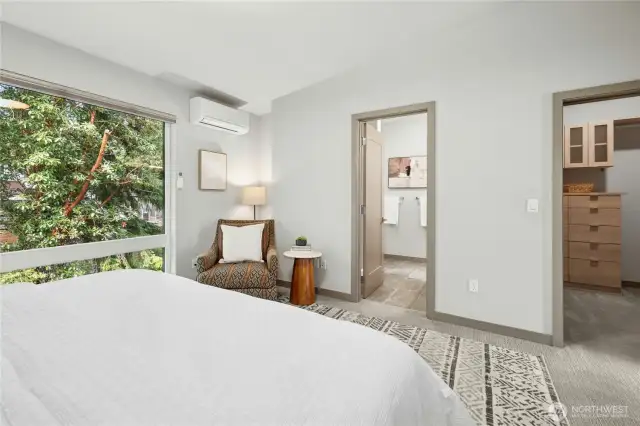 Another look at the primary suite in the back of the home. There are also custom blinds throughout - most are automatic with remotes.