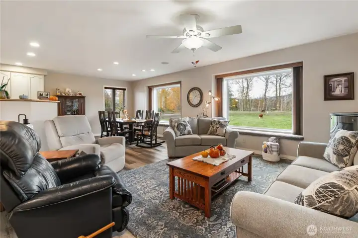 Standing in the doorway you get your first look at the cozy living room and beyond...Notice the recently new laminate flooring and carpets throughout!