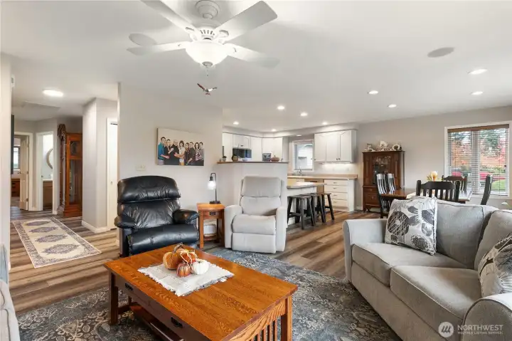 Slide down by the fireplace and look at the open style of the main living areas.