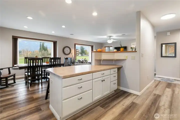 While in the kitchen, note how inclusive it is to the dining, the view and family!