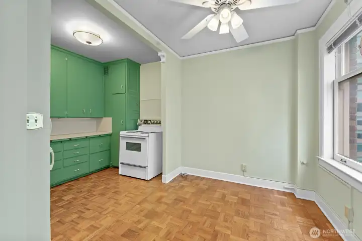 Spacious dining room adjacent to the kitchen.