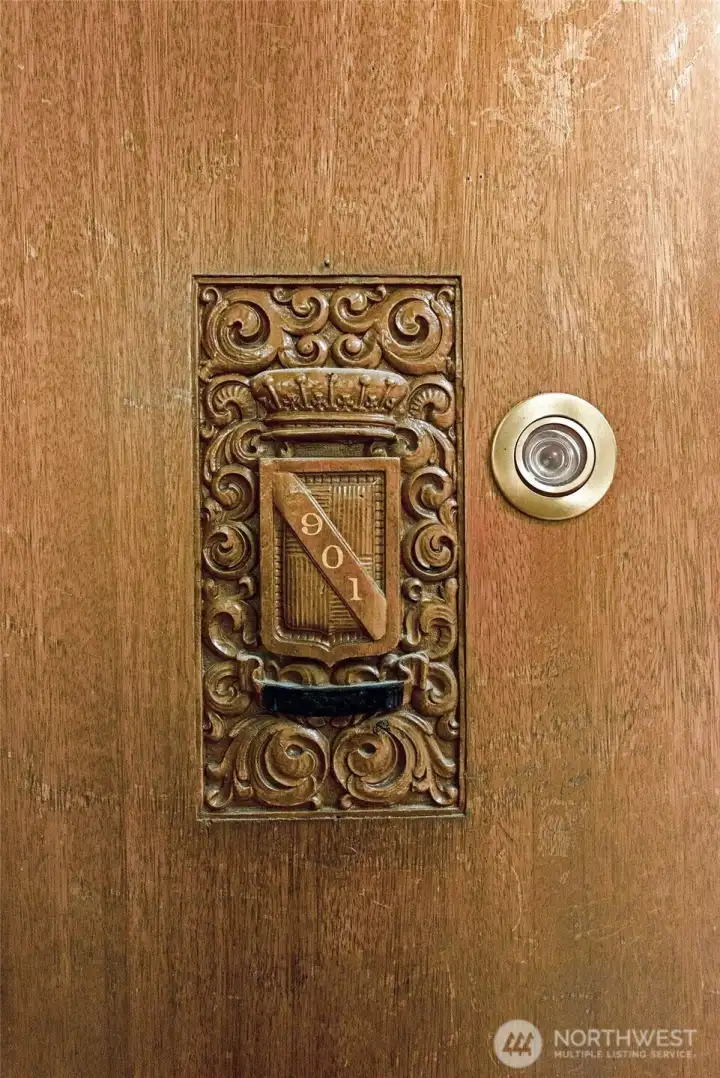 Vintage carved door entry to your new home.