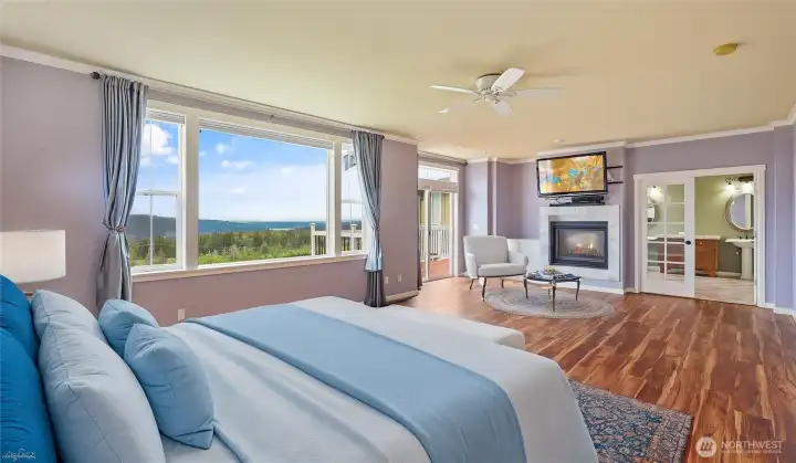Expansive primary bedroom offers spectacular views from the bedroom.   *Virtually Staged*