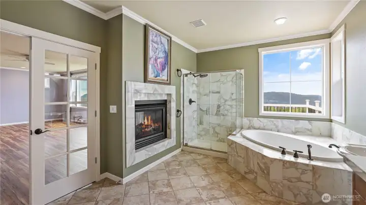 .  Relax with a see-through fireplace, huge walk-in closet and a spa inspired 5-piece ensuite.