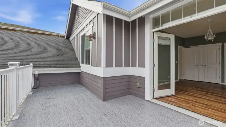 2nd bedroom showcases double doors leading to private deck.