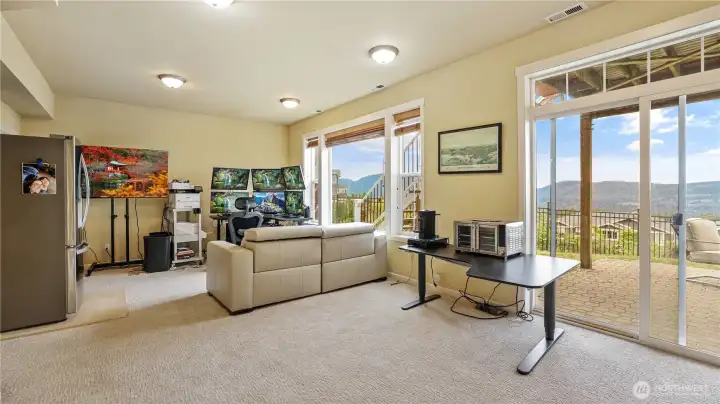 Daylight basement provides a great space for potential additional living quarters. Spacious bonus room with sliding door leading to backyard.