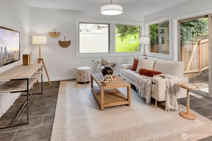 Corner unit w/abundant windows, light...bright and filled with nature surround.  The patio is perfectly sized with newer fence surround and gate for easy entry. Ideal for your 4 legged loves!