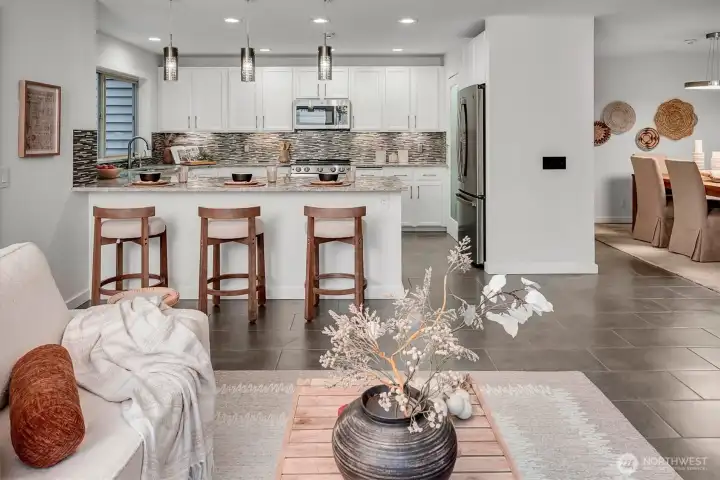 Nicely remodeled is every room w/custom lighting, custom tile flooring, all NEW interior paint, newer SS appliance package too. You are sure to notice + love the abundance of cabinets and storage in this perfect home.    The floorplan is truly ideal for using rooms, re-imagining them the way you most love and choose to live.