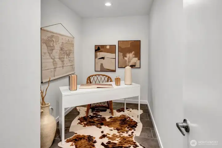 One fun room of the home was originally designed as a LARGE "storage" room. Now the perfect studio/den....sharing a wall with the living room, it could easily be opened up, pony wall perhaps....to create a really special "flex" space w/views of those Cascade mountains too. So many GREAT options in this wonderful home....you choose!