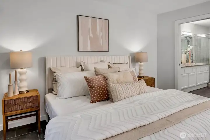 The primary en'suite w/adjacent and beautifully remodeled 5pc spa bath + walk in closet. Custom tile floors and fresh paint leave nothing to do but move in and love living in this perfect home in Walnut Hills.