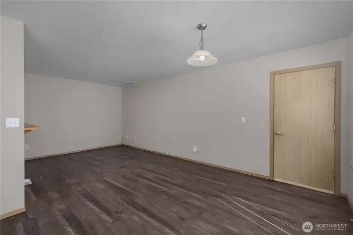 Large family room and access to the garage.