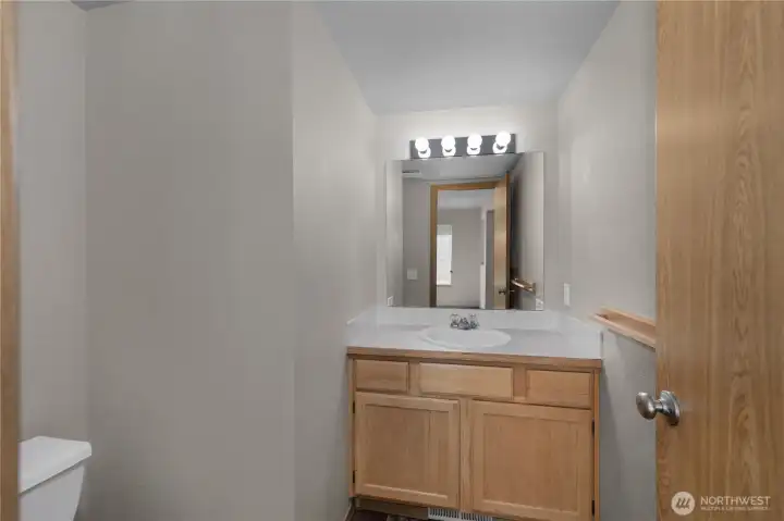 Half bath on the main floor,perfect for guests.