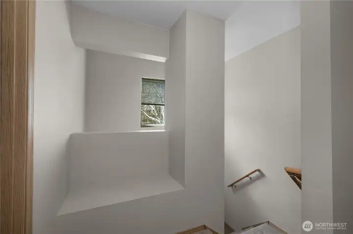 2nd floor landing has this cute little bench, perfect for a little reading nook