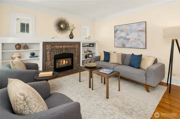 Beautiful built-in bookcases and cozy gas fireplace