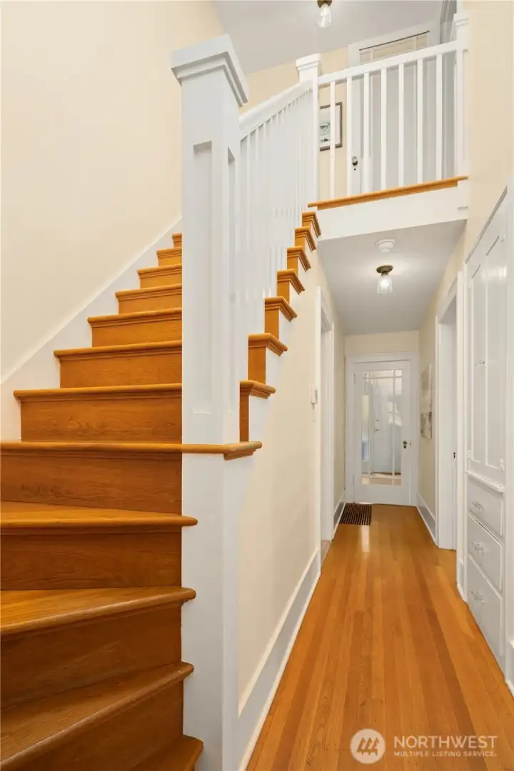 Vaulted staircase with gorgeous skylight leads you to the Primary Suite.