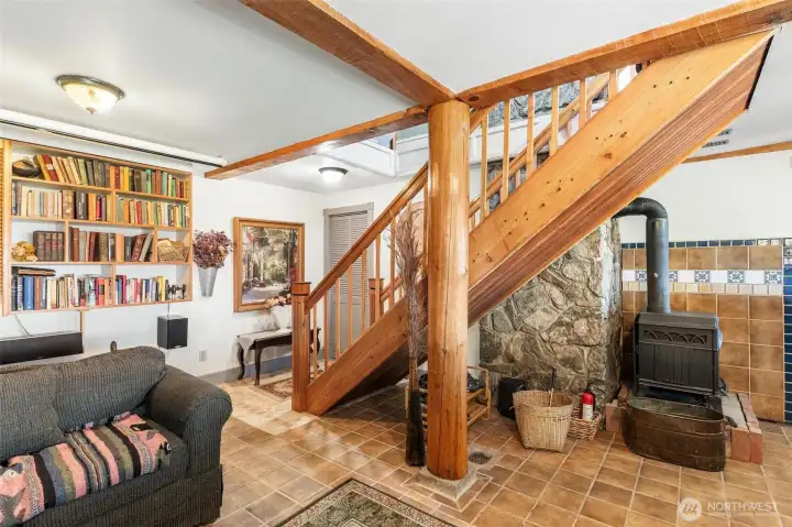 Daylight basement with stove. Stove does and excellent job of heating the home with minimal effort Daylight basement with stove. Stove does and excellent job of heating the home with minimal effort