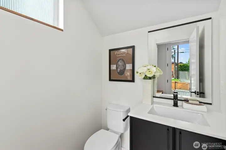 Coveted main floor powder room. Coveted main floor powder room.
