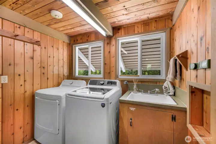 Dedicated laundry room on upper floor
