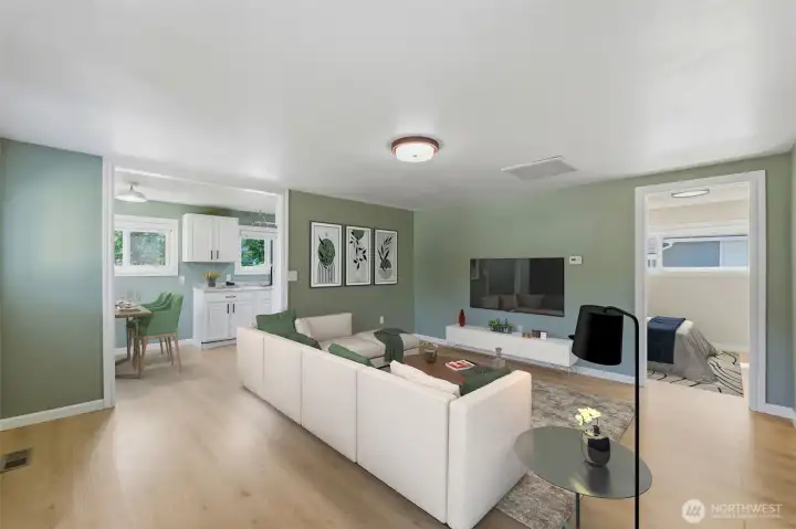 In this virtually staged photo, you can see just how easy it is to entertain with the open concept layout. In this virtually staged photo, you can see just how easy it is to entertain with the open concept layout.