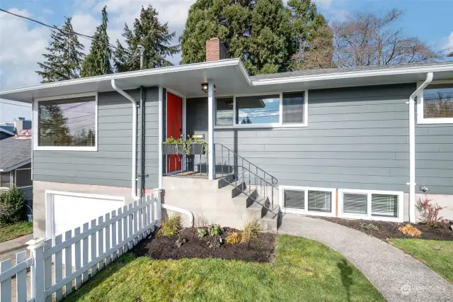 This classic 1956 Mid-century home with newer hardy plank siding will delight you!