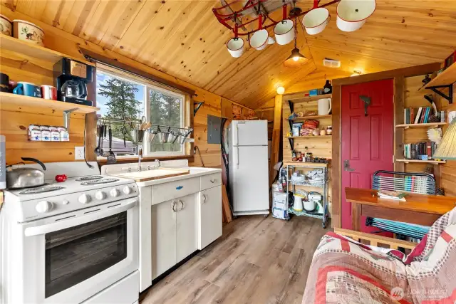 The tiny home's kitchen takes 'glamping' to a whole new level.