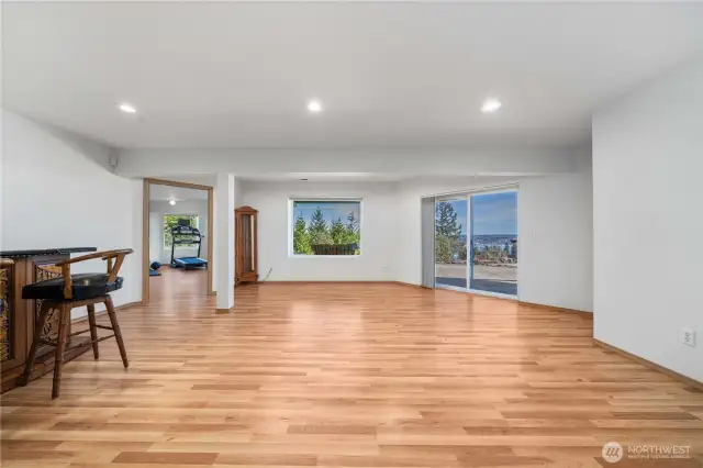 Another view of versatile space with sliding door access to patio