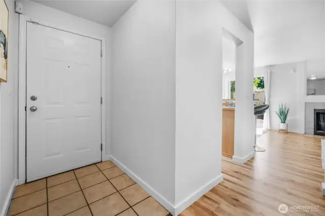Tiled front entry as you walk in. Notice the 6 paneled door.