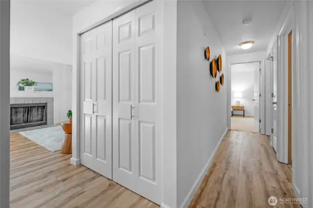 Recently updated LVP flooring covers the hallways, kitchen, dining area, and living room. Nice quality full interior paint job and notice the light painted floor trim.