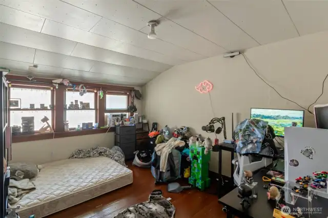 Upstairs bedroom adjacent to large recroom space