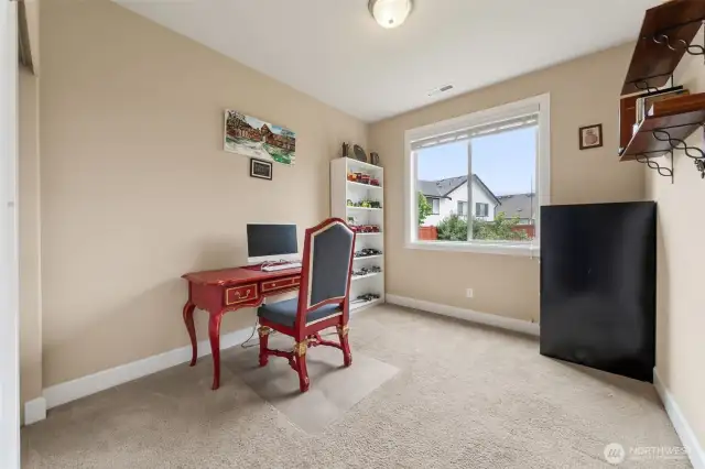 Main floor bedroom currently used as an office