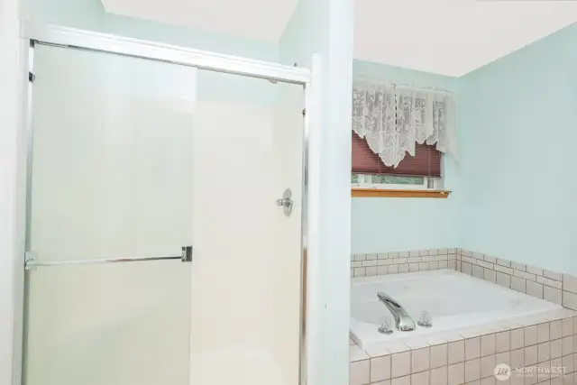Relax in your jacuzzi spacious tub after a long day.