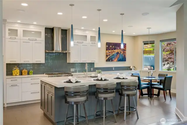 The oversized island is perfect for entertaining and the open concept layout connects the host or hostess to guests while preparing food.