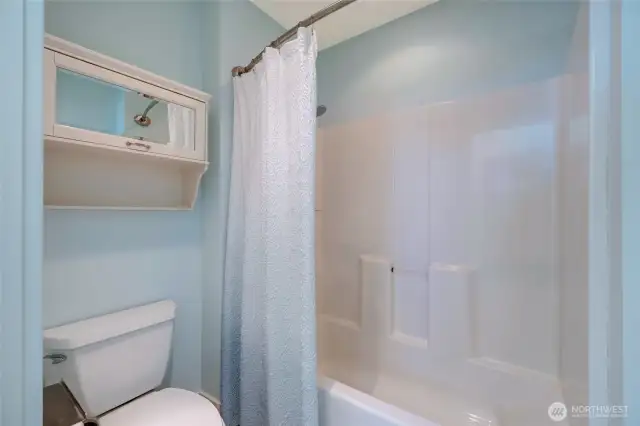 Second floor full bathroom separate tub and toilet room.