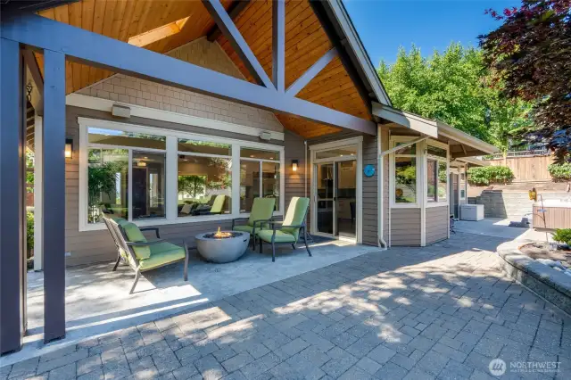 Another view of the covered patio. The surround sound system is zoned to allow your choice of music to be heard outside as well!