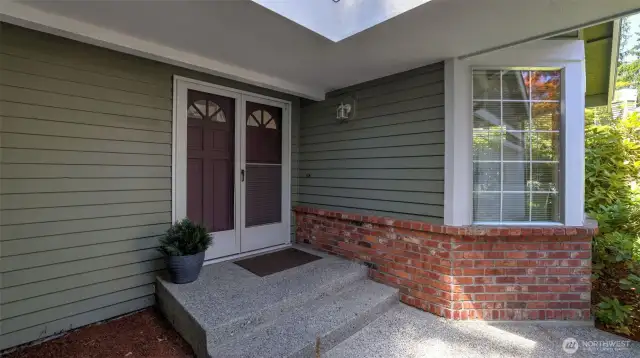 The home has cedar siding, brick facia, composition roof and a wonderful floorplan.